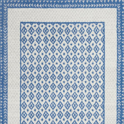 Ivory and Blue Geometric Area Rug